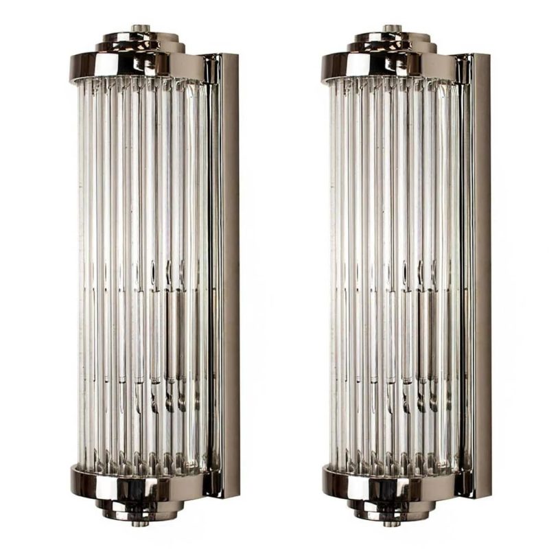 A pair of vintage Art Deco skyscraper-style wall sconces made of nickel and brass with glass rods, measuring 15 inches in length and 4 inches in breadth.