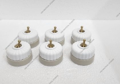 Vintage set of 6 white plated brass and ceramic switches, perfect for elegant home decor.