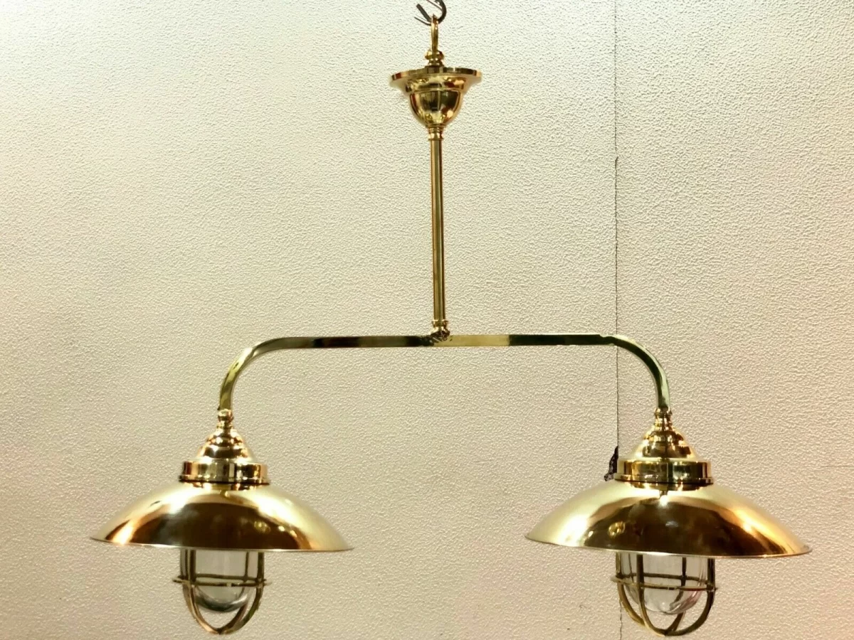 Add nautical elegance to your home! This polished brass double pendant chandelier brings authentic ship-style lighting to your kitchen island, bar, or dining area. Handcrafted, timeless, and built to last.