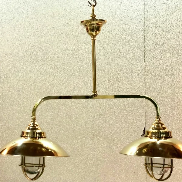Add nautical elegance to your home! This polished brass double pendant chandelier brings authentic ship-style lighting to your kitchen island, bar, or dining area. Handcrafted, timeless, and built to last.